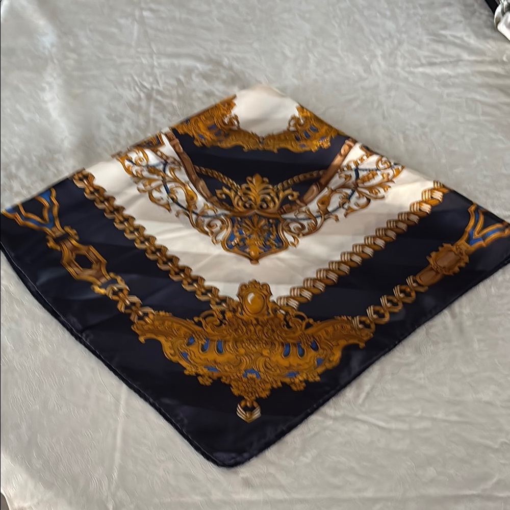 Made in Italy 100% silk scarf. 34”X34”